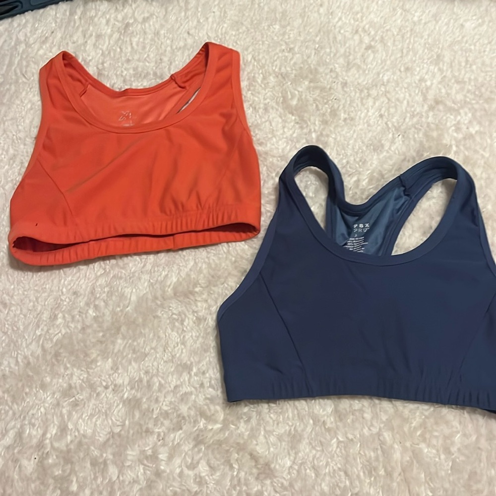 Peach and Blue sports bras, no pads. Both size: small